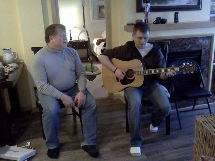 David and his dad singing Christmas carols